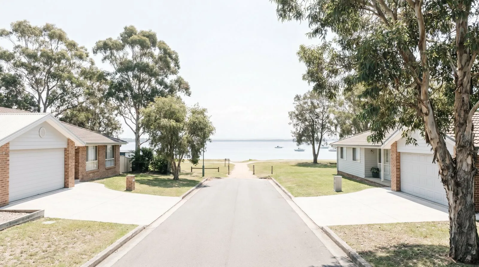 A quiet lakeside residential street in Speers Point